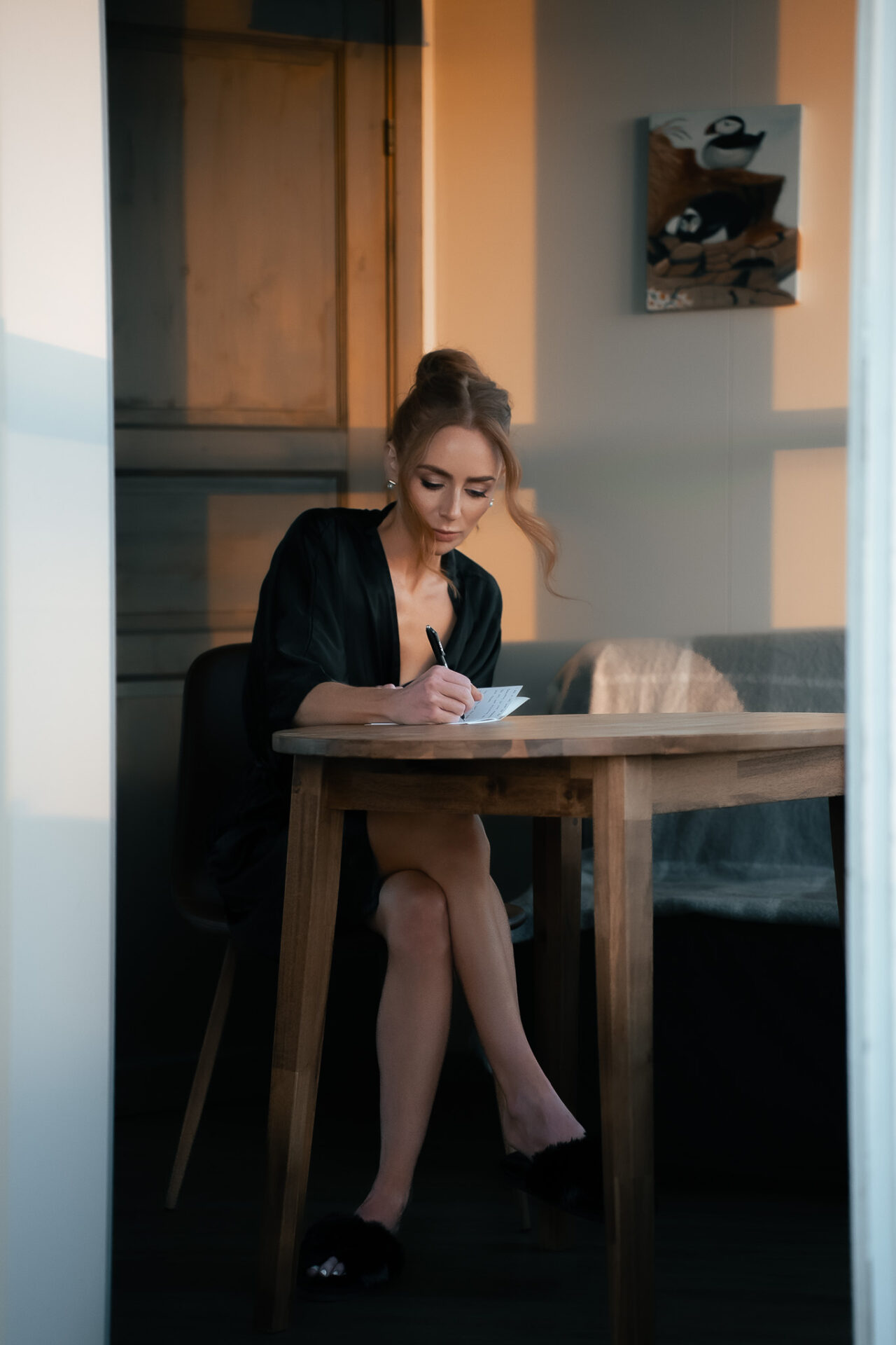 The bride writing her vows inside a cabin in Iceland
